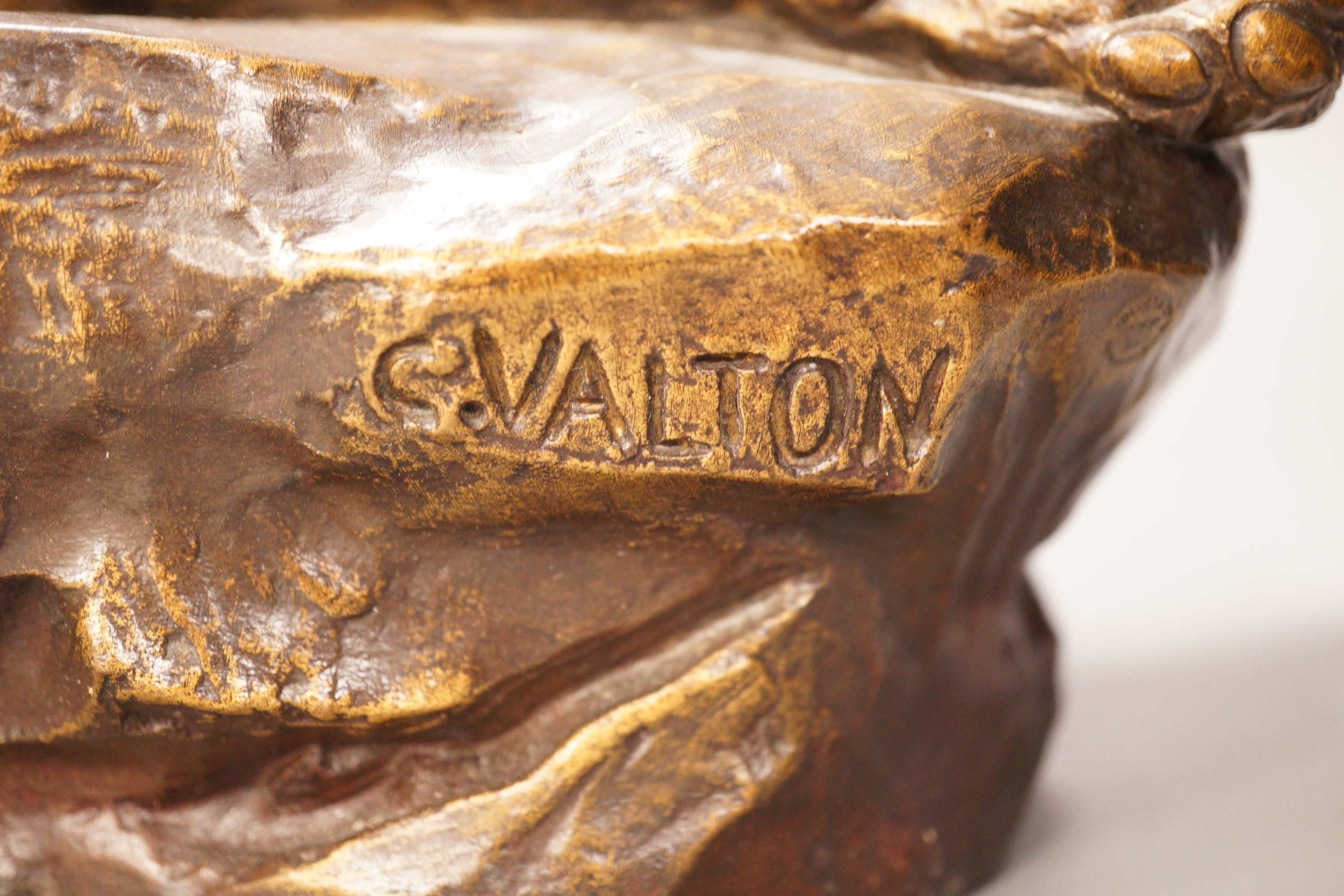 After Charles Valton, a gilt bronze study of a recumbent lioness, 39cm
